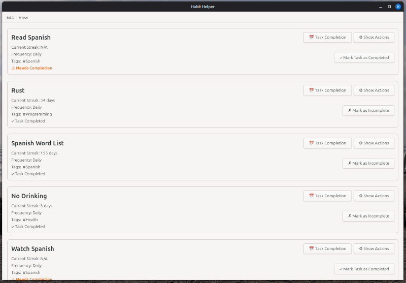 Listing saved tasks with a light desktop theme active.