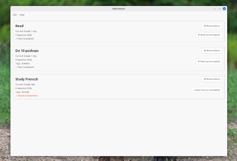 Listing saved tasks with a light desktop theme active.